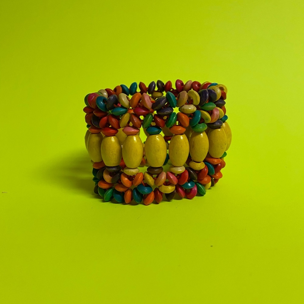 Vibrant boho type wood carved muticoled, stretchy bracelet